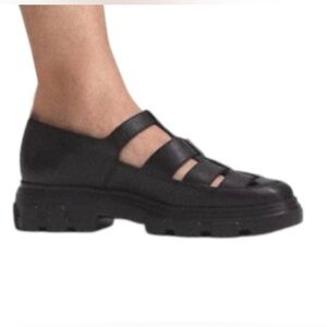 Black leather loafer sandals. US sizes